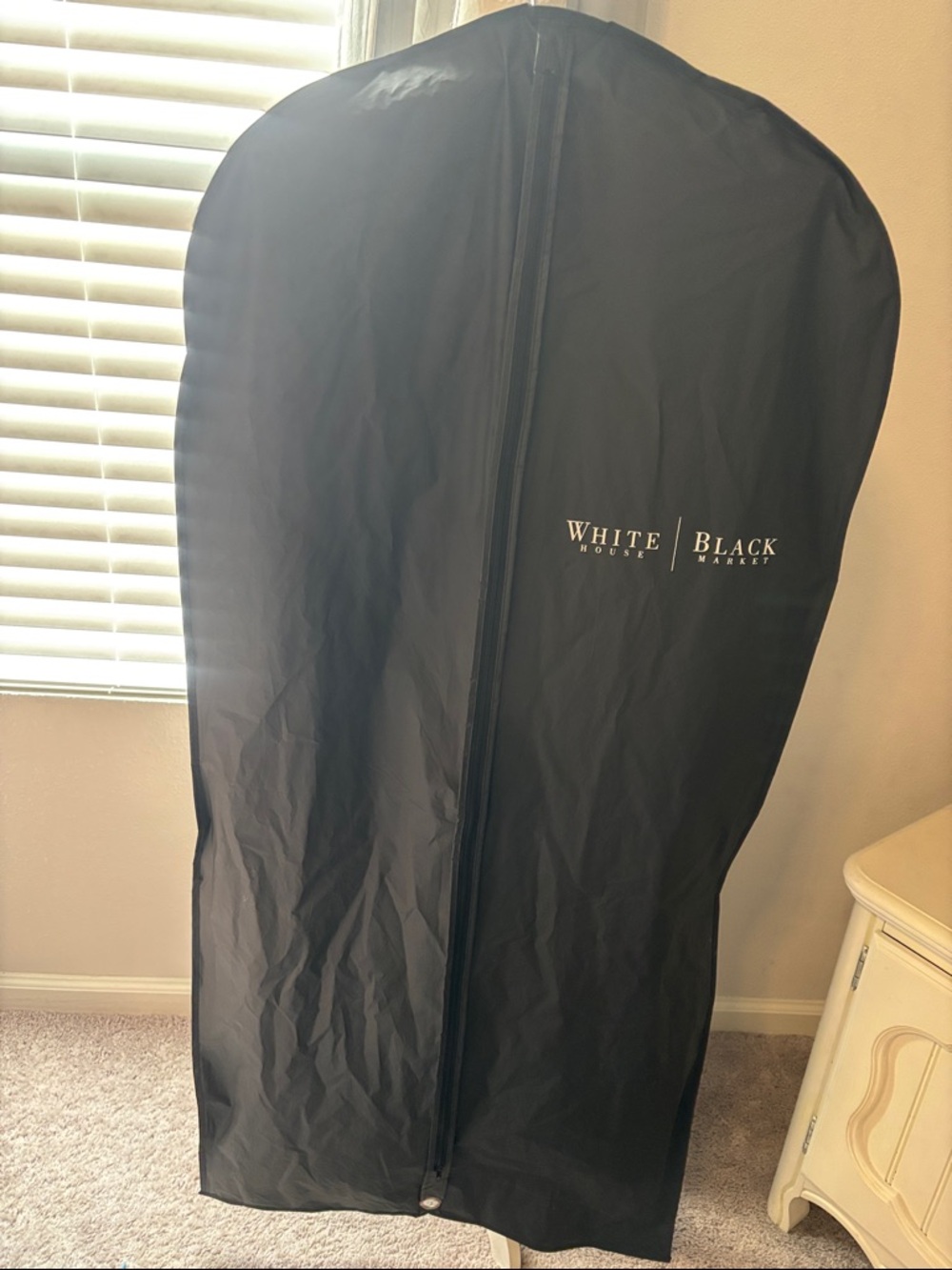 White House Black Market Black Garment Cover with White Logo